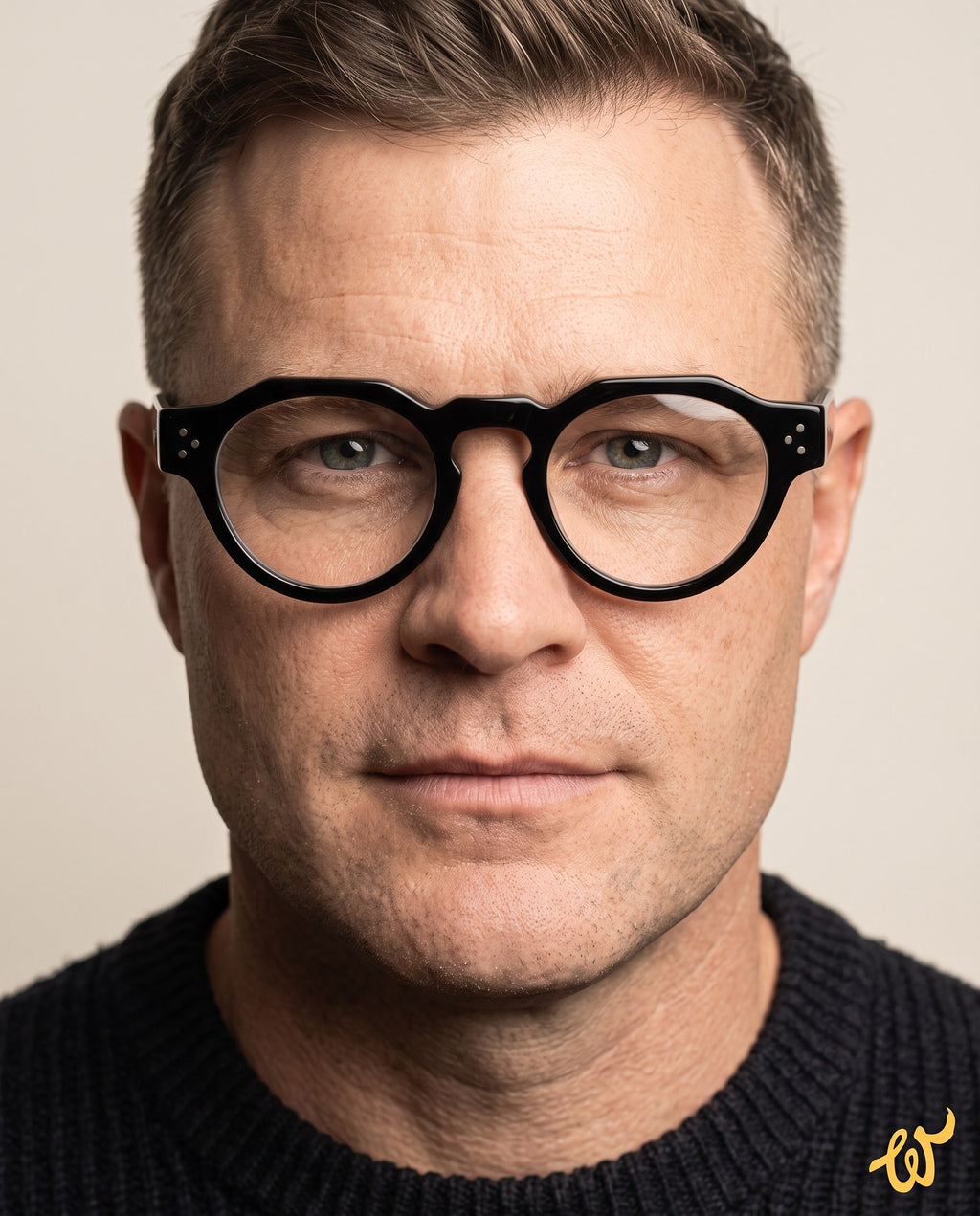 Man wearing Woolet 007 Round / Panto black eyeglasses — 158 mm frame on a wide face