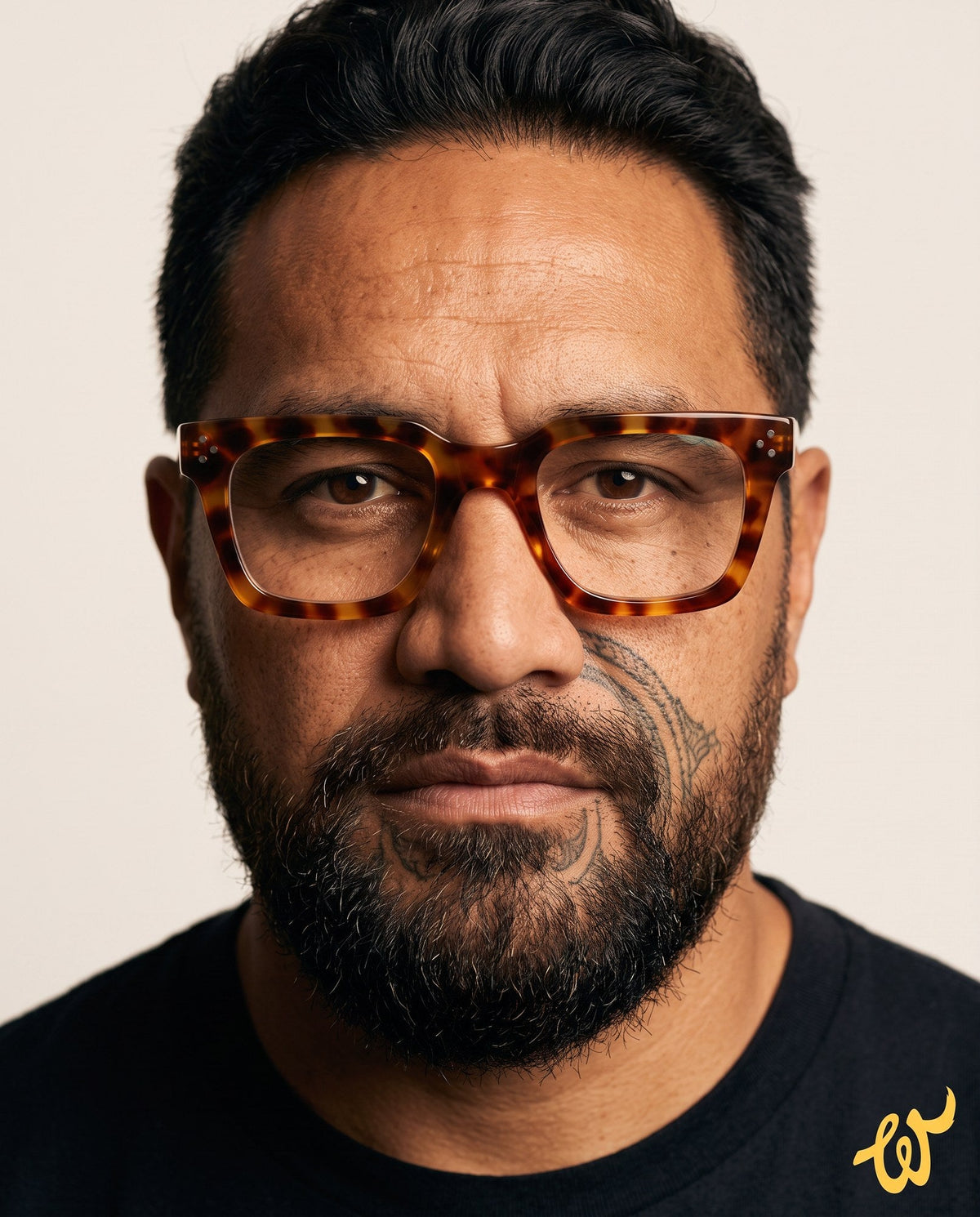 Man with a wide face wearing Woolet 009 Soft Square eyeglasses in havana